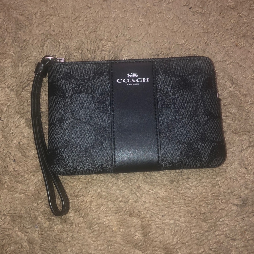 Brand new, never used black Coach wristlet